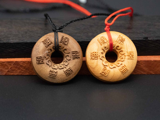 tibet buddhism,buddhism pendant,wood carving,wood pendant,carve wooden pendant,Symbolizing reincarnation and the cycle of life.