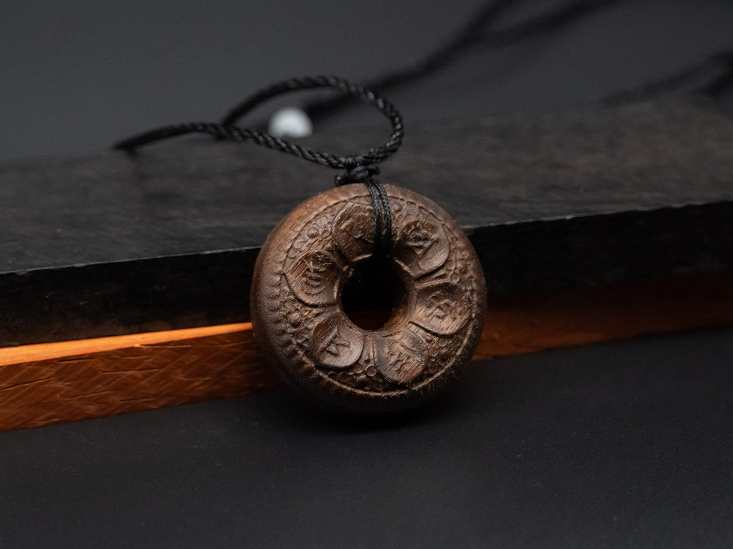 tibet buddhism,buddhism pendant,wood carving,wood pendant,carve wooden pendant,Symbolizing reincarnation and the cycle of life.