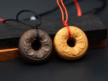 tibet buddhism,buddhism pendant,wood carving,wood pendant,carve wooden pendant,Symbolizing reincarnation and the cycle of life.