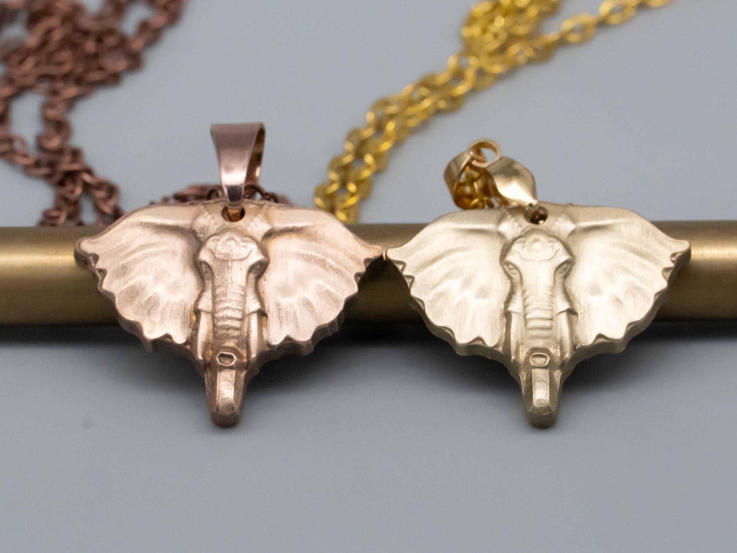 Elegant Bronze & Brass Elephant Art: Pendants, Necklaces, Reliefs, and Vintage Carvings - Shop Now!