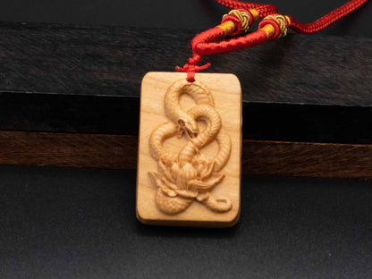 snake necklace,year of snake,lotus pendant,wood snake pendant,wood carving,carve snake pendant,symbolize Transformation and Rebirth