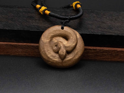 2025 year of snake,snake necklace,snake pendant,wood snake pendant,wood carving,carve snake pendant,symbolize Transformation and Rebirth